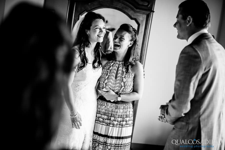 bride and sister smiling black and white