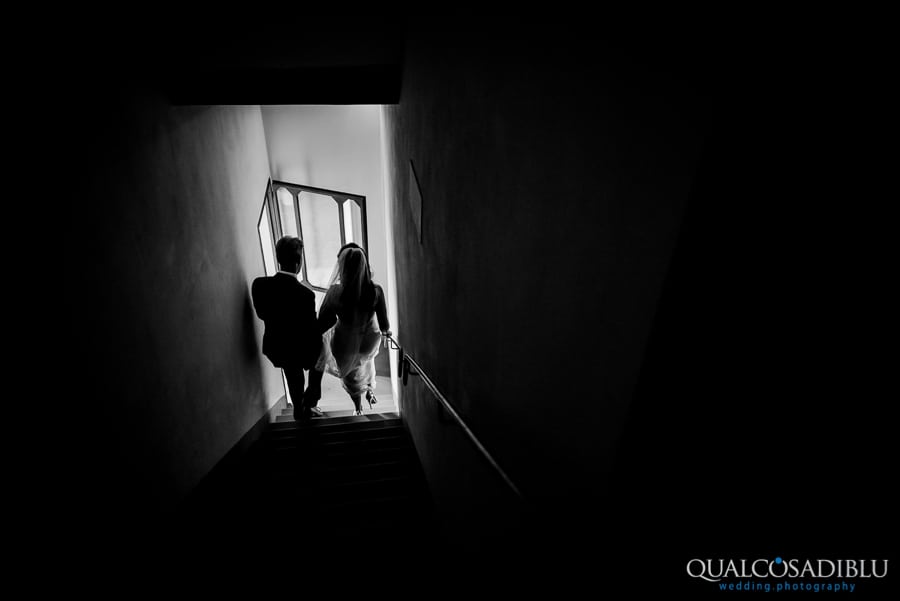 father and bride going to the ceremony spot black and white