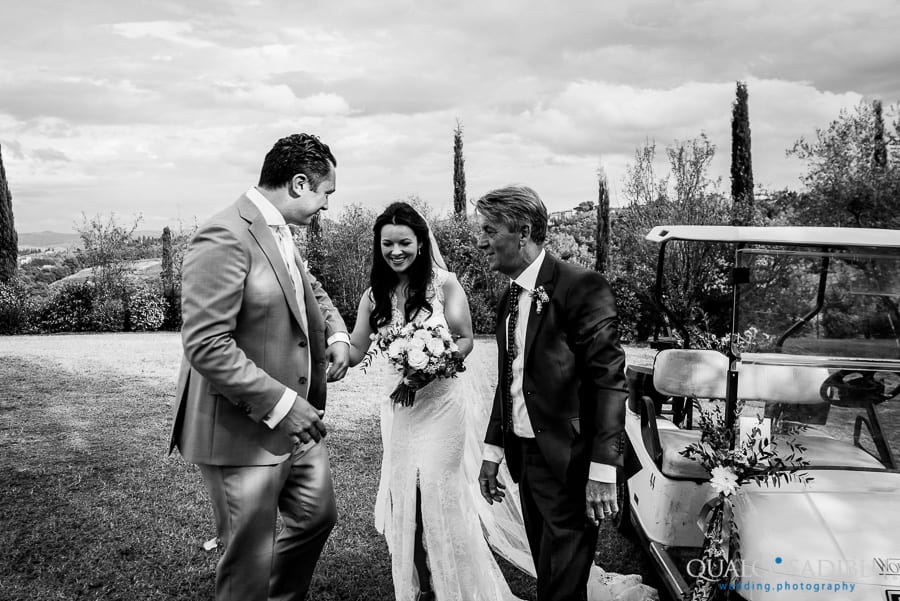 arrival of the bride with father black and white