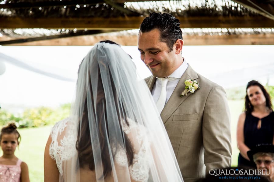 groom smiling emotioned