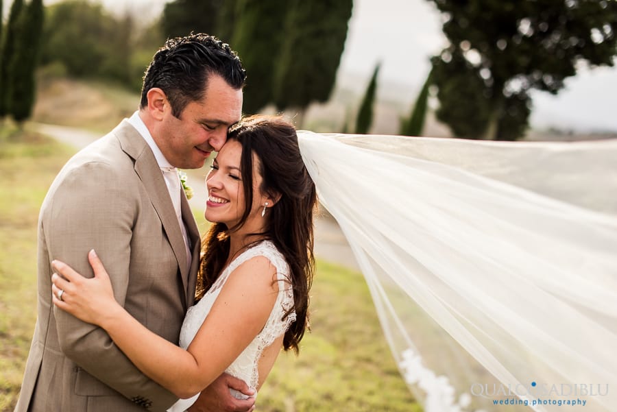 bride and groom smiling