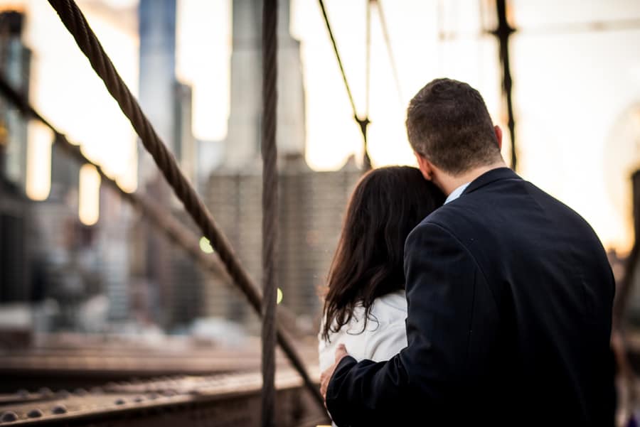 embraced couple together new york background