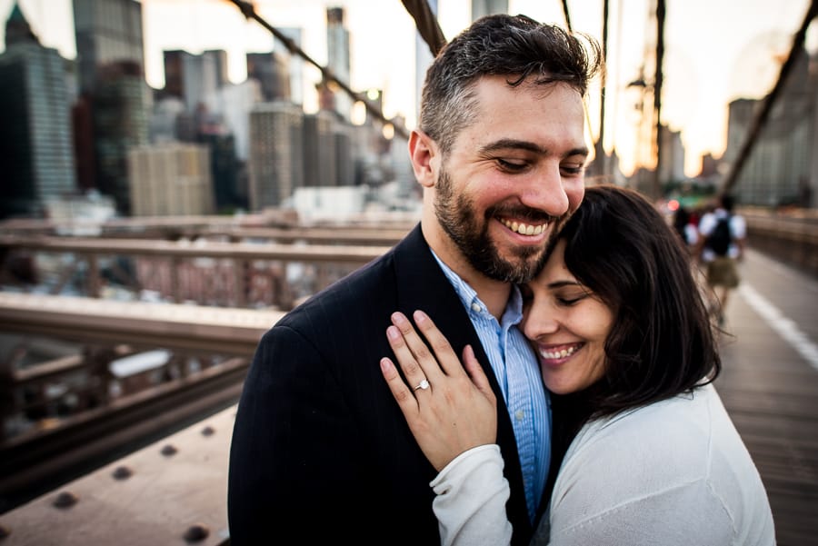 detail of love couple brooklyn bridge smiling