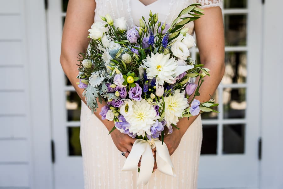 bride bouquet flowers white green purple