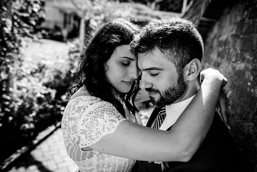 wedding bride groom hug black and white