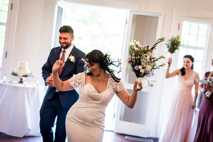 bridge and groom dancing and having fun