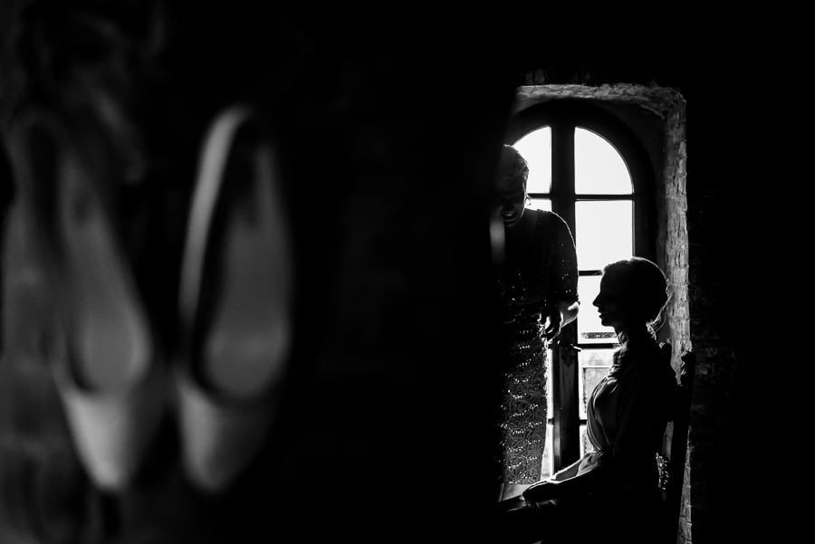 bride getting ready shoes black and white