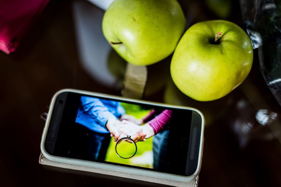 engagement ring green apples display smartphone