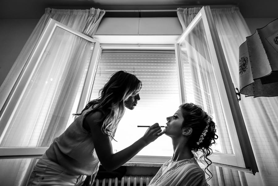 bride getting ready make up black and white
