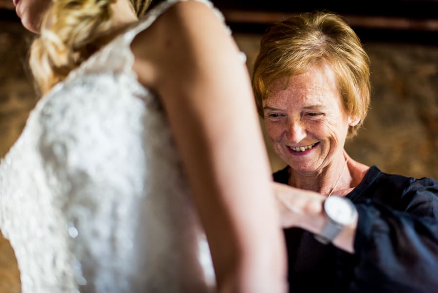 mother of the bride smiling wedding dress