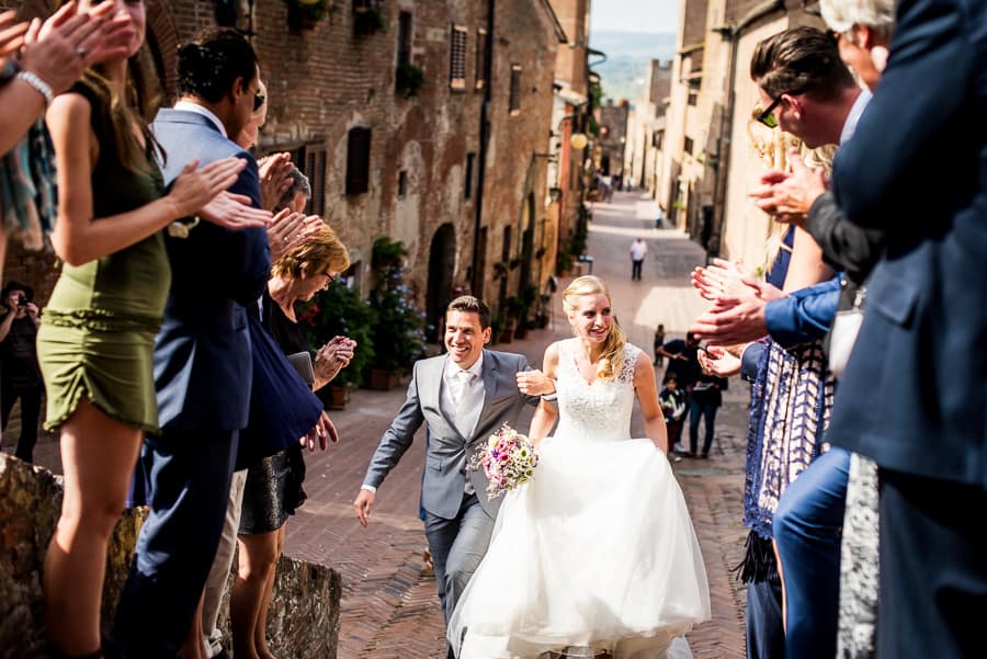 bride groom walking on the stairs-certaldo