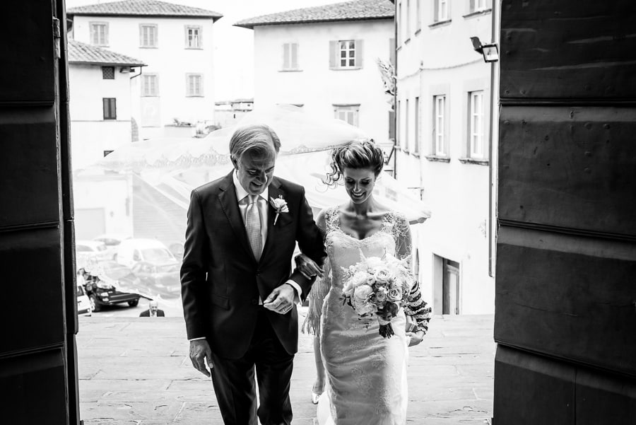 bride and father coming to the church