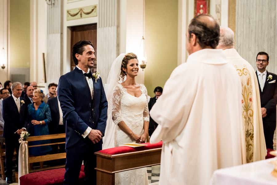 bride groom smiling ceremony church