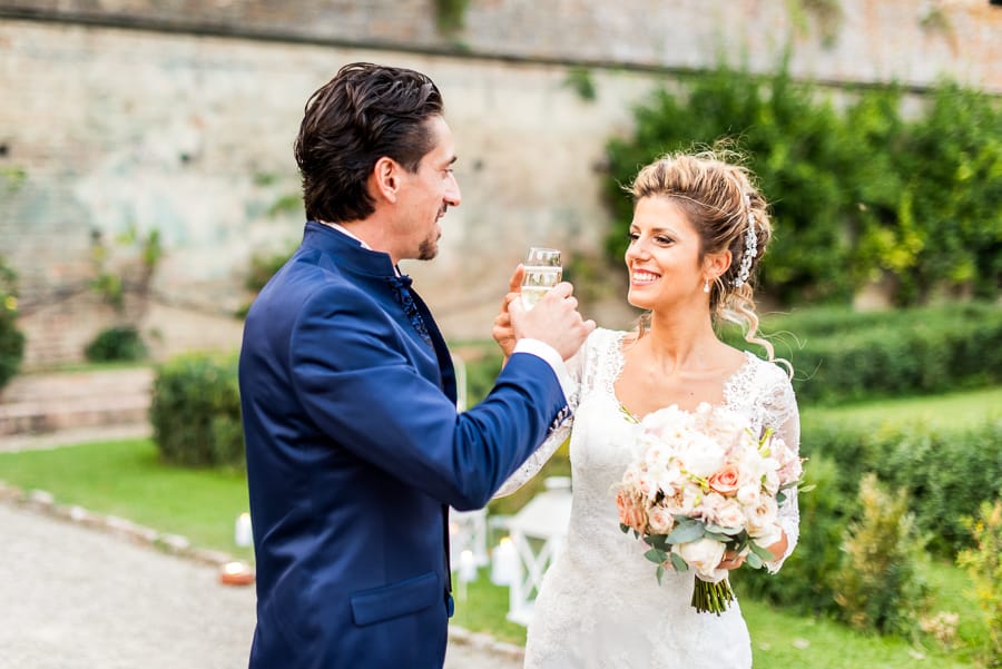 cheers bride and groom prosecco glasses