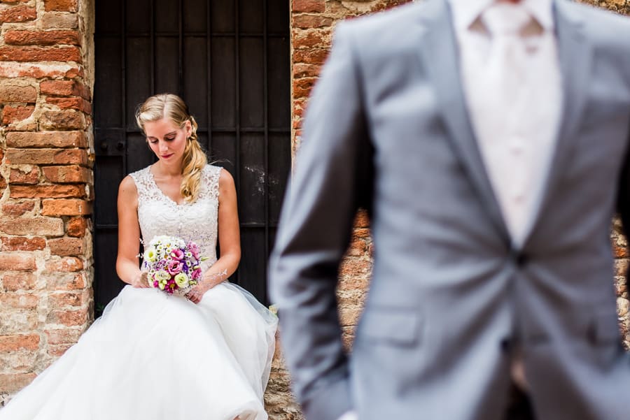 bride sit looking the bouquet certaldo