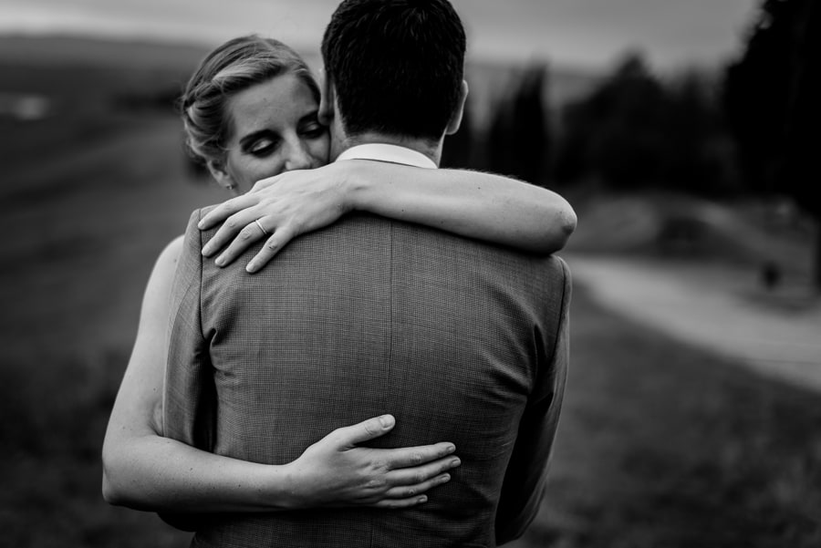 romantic hug bride groom black and white