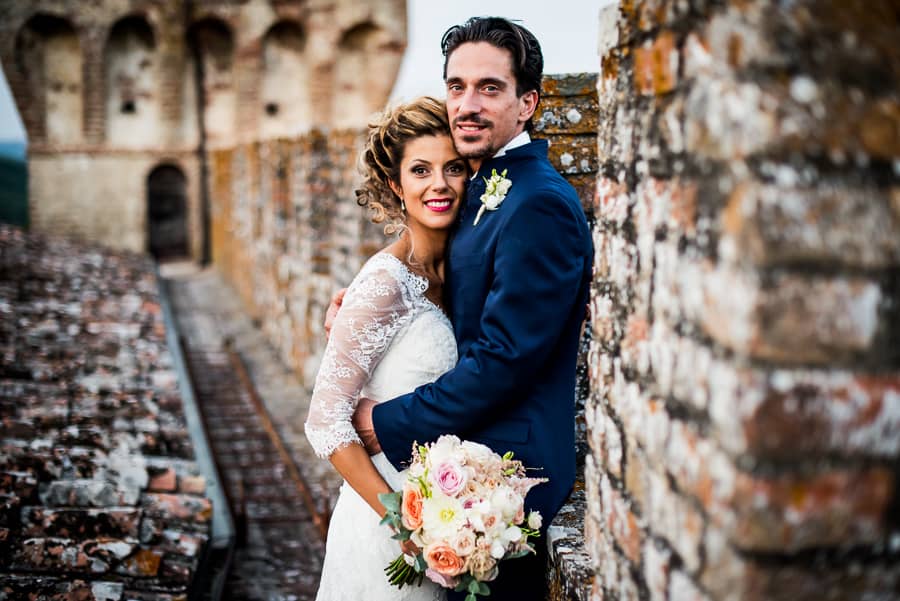 married couple embraced castle oliveto