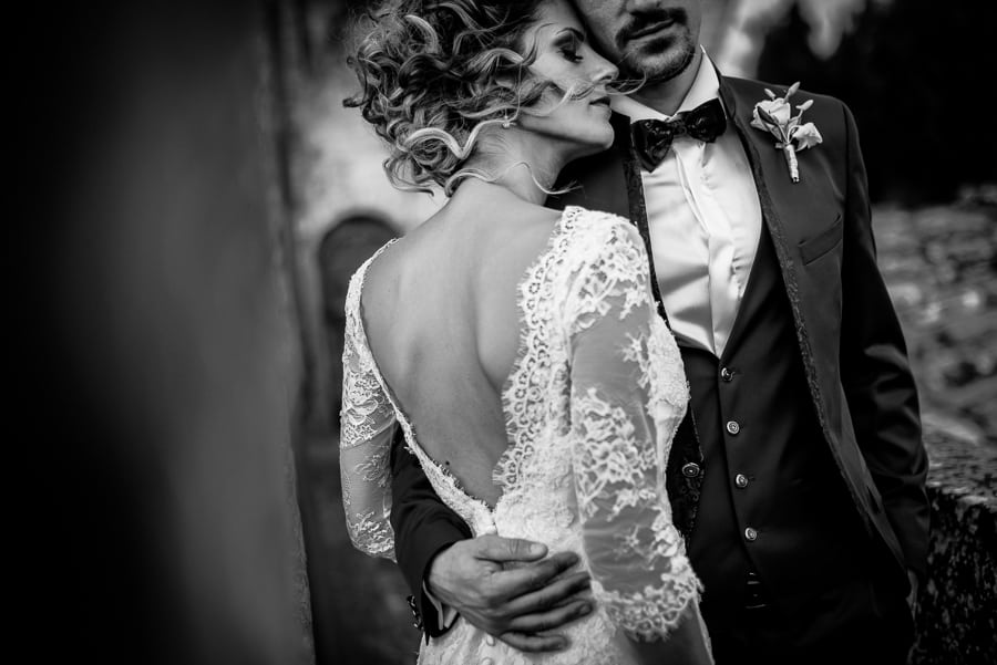 bride groom hug black and white