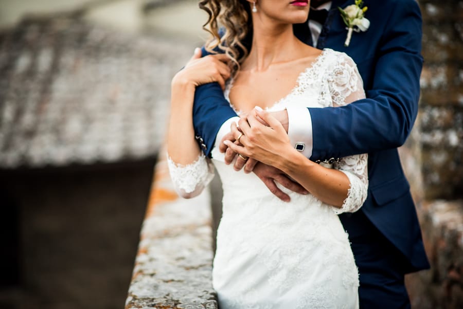 wedding couple embraced details hands wedding rings