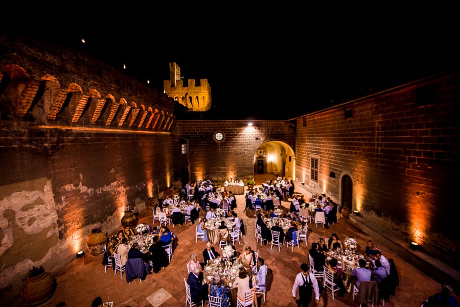 castle oliveto wedding dressed table night lights view from the top