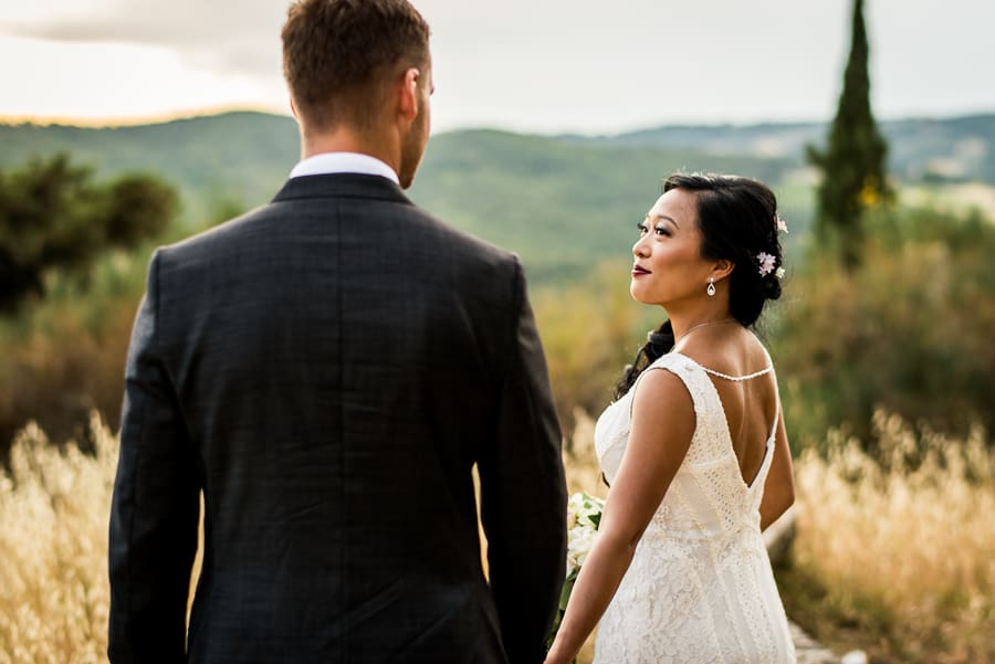 bride walking with groom shooting