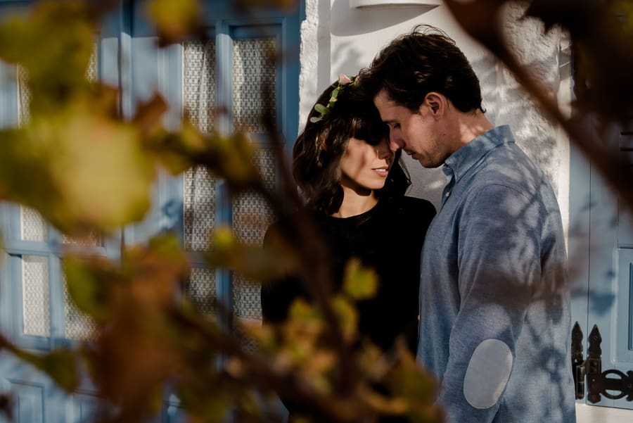 couple in one intimate moment in santorini