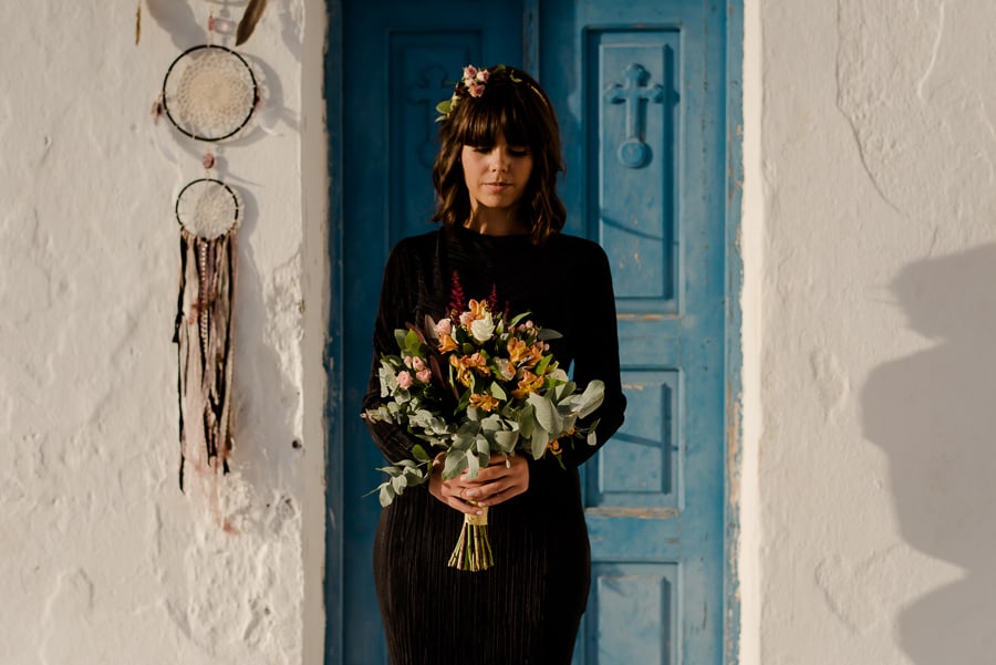 bride to be with flowers in santorini