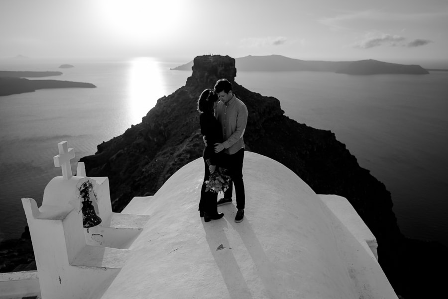 embraced couple skaros rock roof church