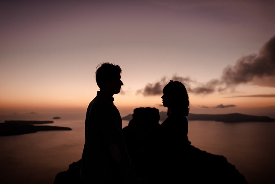 emotioned couple sunset skaros rock imerovigli