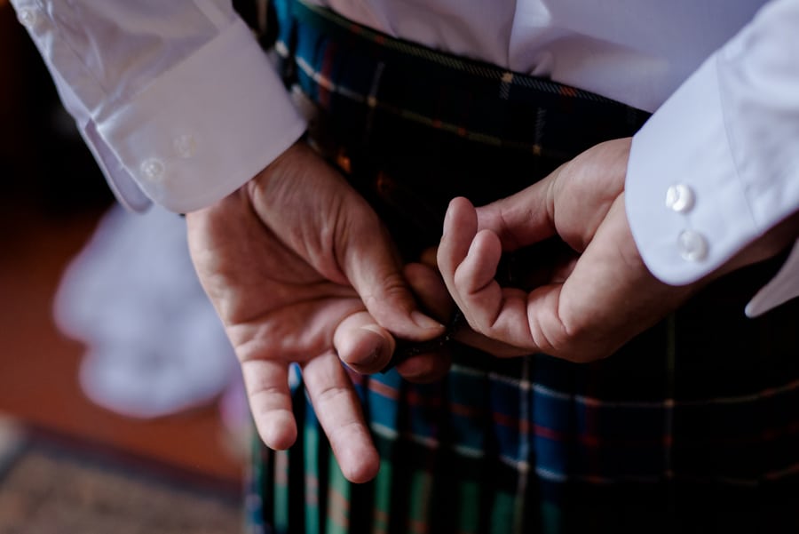 Fingers of the groom