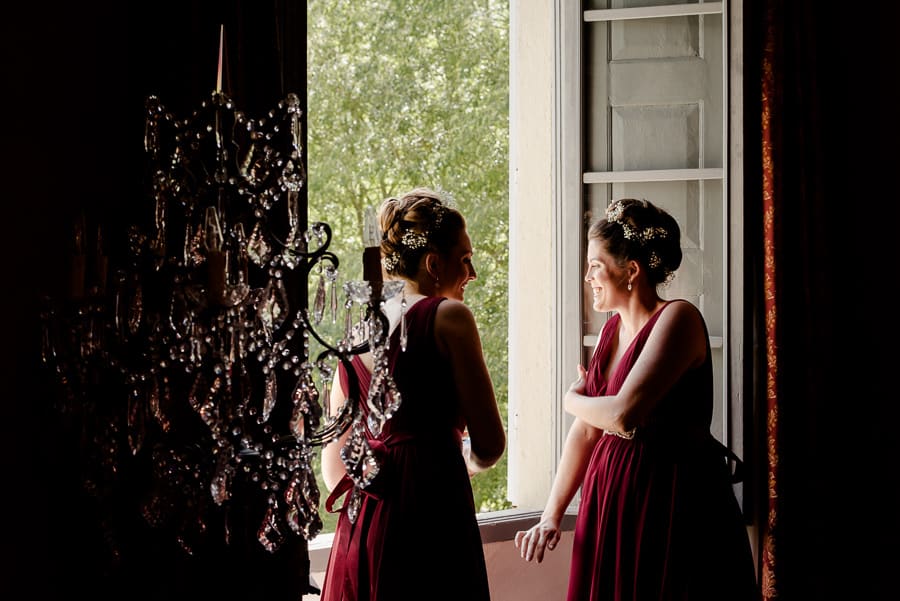 Bridesmaids at the window at Villa il Salicone Pistoia