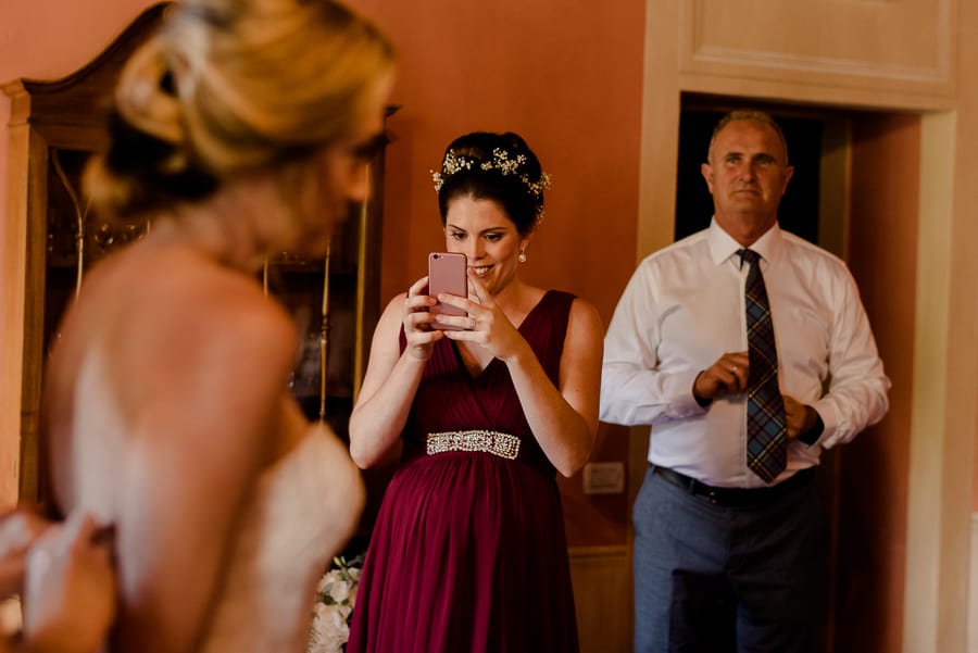 Bride dressing up getting ready