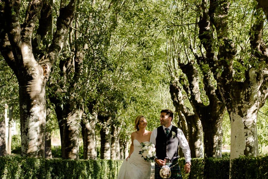 Bride and groom walking together