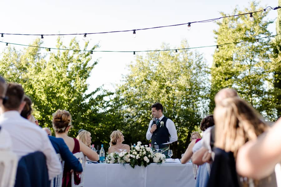 Groom making the speech to the bride at the receipt