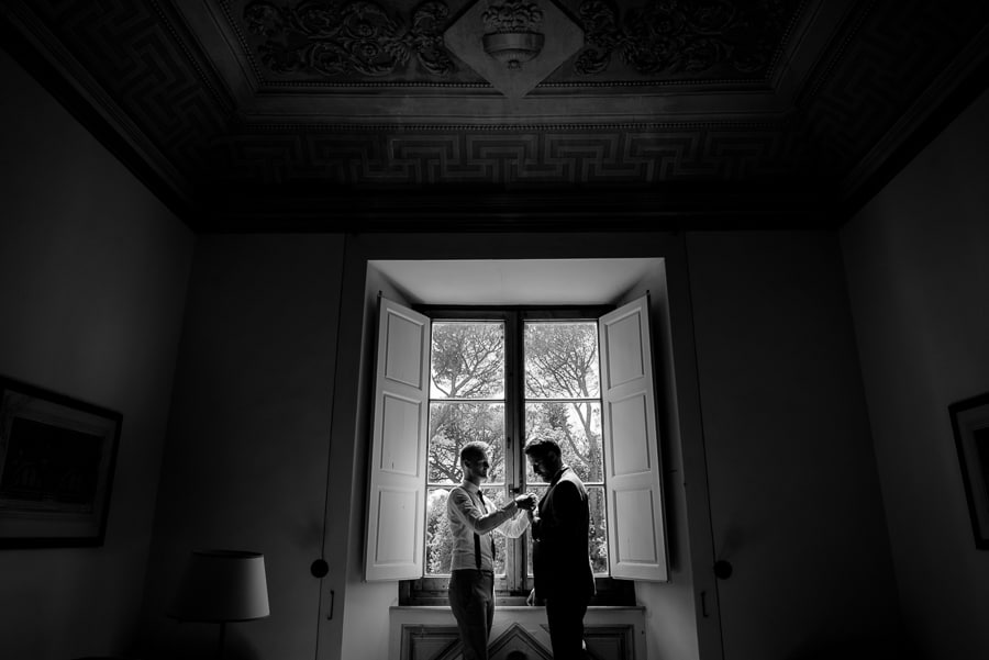 groom and bestman getting ready black and white