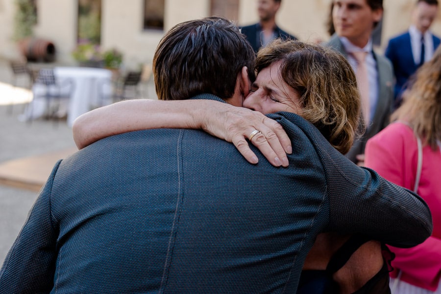 mother of the groom hug