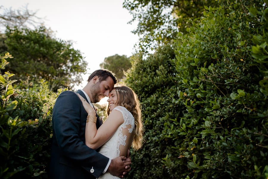 bride and groom posing