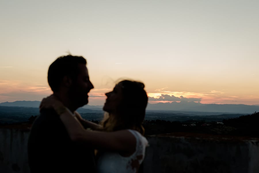 Bride and groom at the sunset