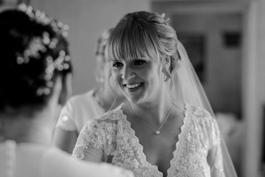 bride getting ready black and white