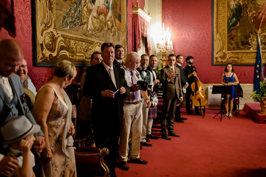 guests waiting in the red hall palazzo vecchio florence