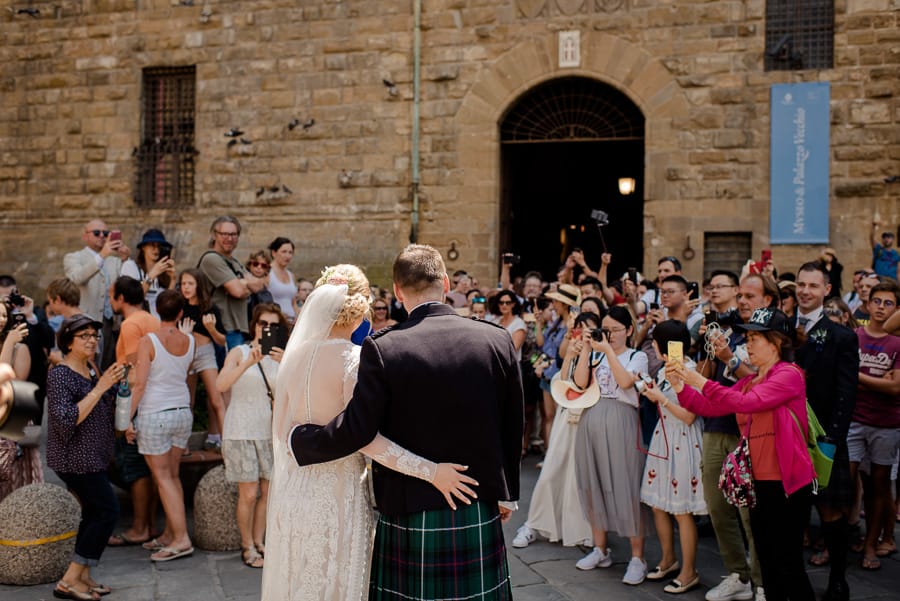 Bride and Groom announce theirselves in front to the people in florence