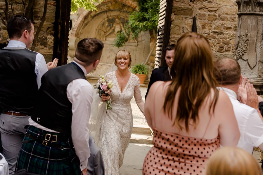 bride and groom entering to the receipt dinner