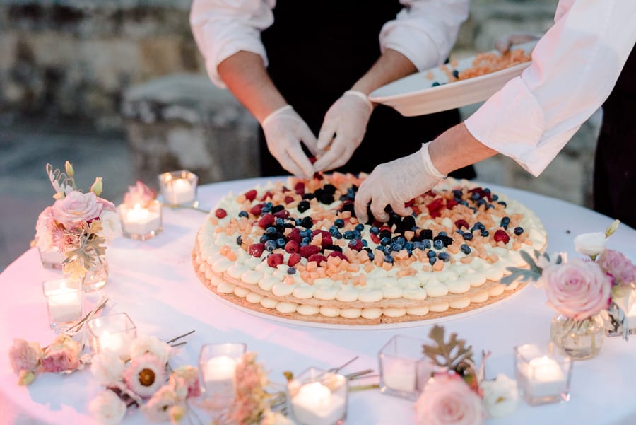 Bakers are making the wedding cake in vincigliata castle