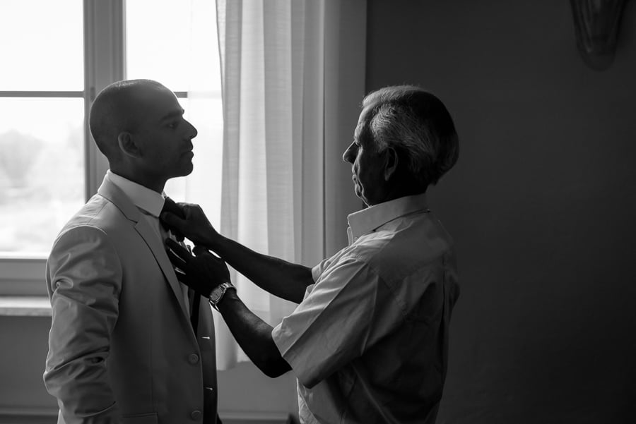 Groom and his father getting ready