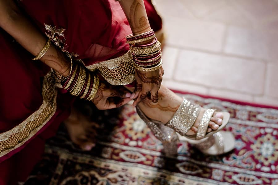 Bride putting on her shoes