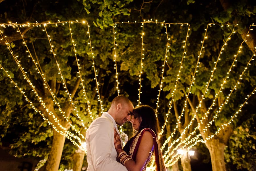 Bride and groom with lights