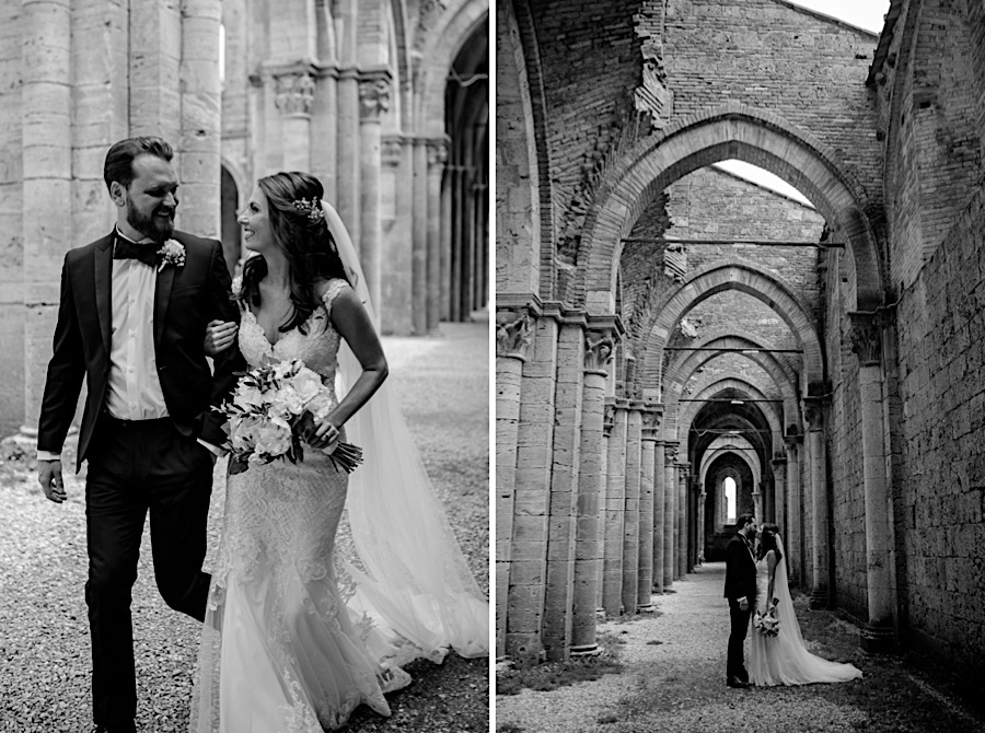 Bride and groom walking together at san galgano abbey black and white