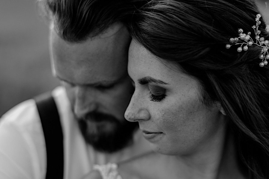 Bride and groom intimate moment black and white