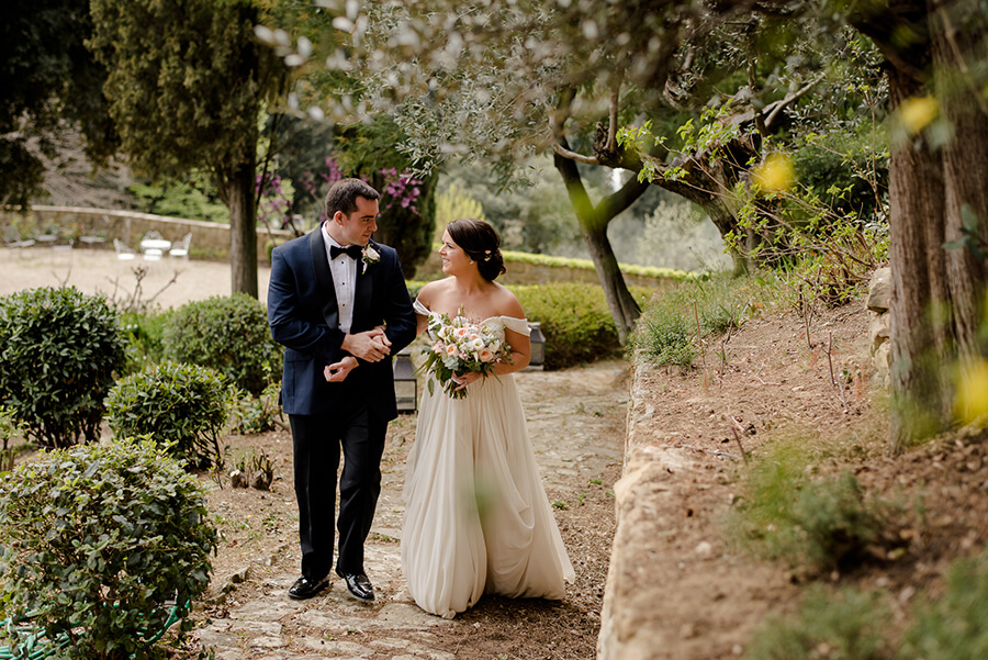 Bride and Groom walking together at Villa Le Fontanelle Florence