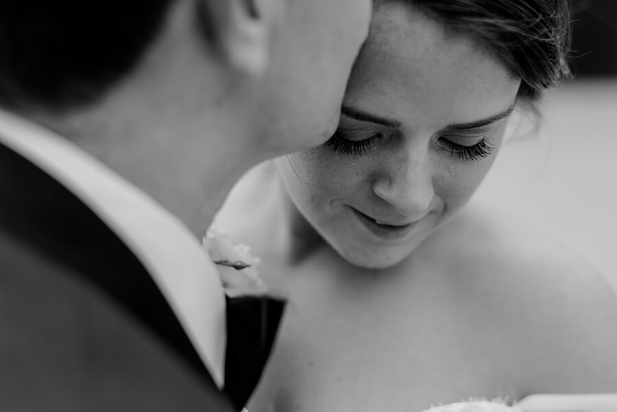 Portrait of the Bride and Groom intimate moment black and white photo